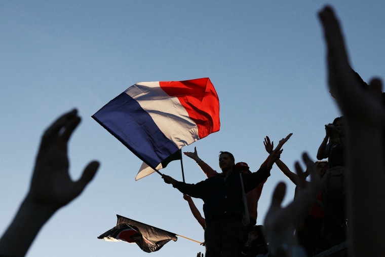A broad left-wing coalition was leading a tight French legislative election, ahead of both President's centrists and the far right with no group winning an absolute majority, projections showed.