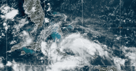 Tropical Depression 4 gets organized and is expected to strengthen