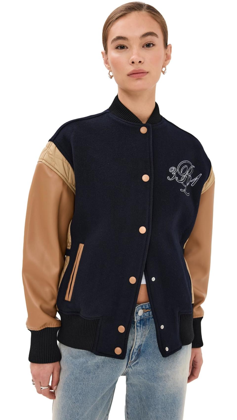 <p><a href="https://www.amazon.com/dp/B0CRMNJ36B?tag=syn-yahoo-20&ascsubtag=%5Bartid%7C10051.g.40754525%5Bsrc%7Cyahoo-us" data-i13n="elm:affiliate_link;elmt:premonetized" rel="sponsored" target="_blank" data-ylk="slk:Shop Now;elm:affiliate_link;elmt:premonetized;itc:0;sec:content-canvas" class="link  rapid-with-clickid etailiffa-link">Shop Now</a></p> <p>Boxy Fit Varsity Bomber Jacket</p> <p>amazon.com</p> <p>$650.00</p>