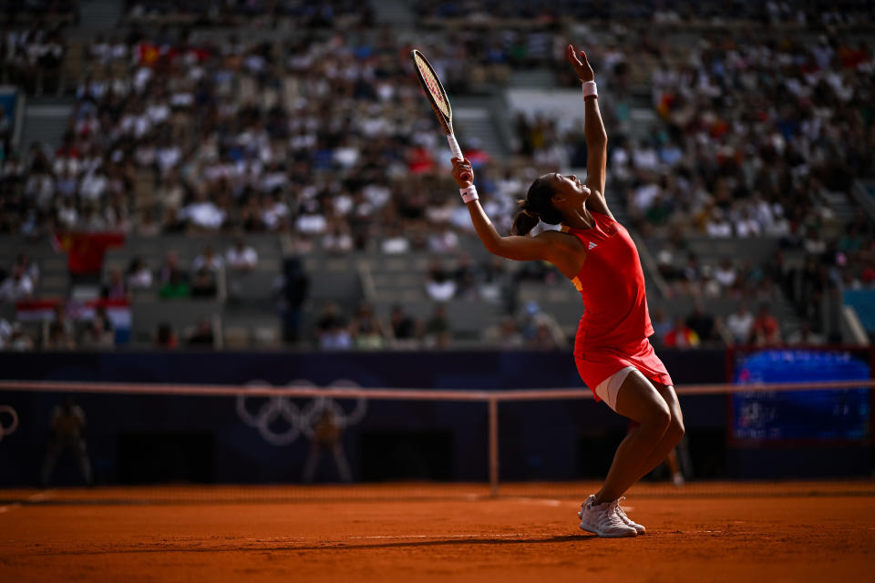 Qinwen Zheng of China in action against Donna Vekic of Croatia in the Women's Singles Gold Medal match on day eight of the Olympic Games at Roland Garros on August 03, 2024 in Paris, France. (Daniel Kopatsch/Getty Images)