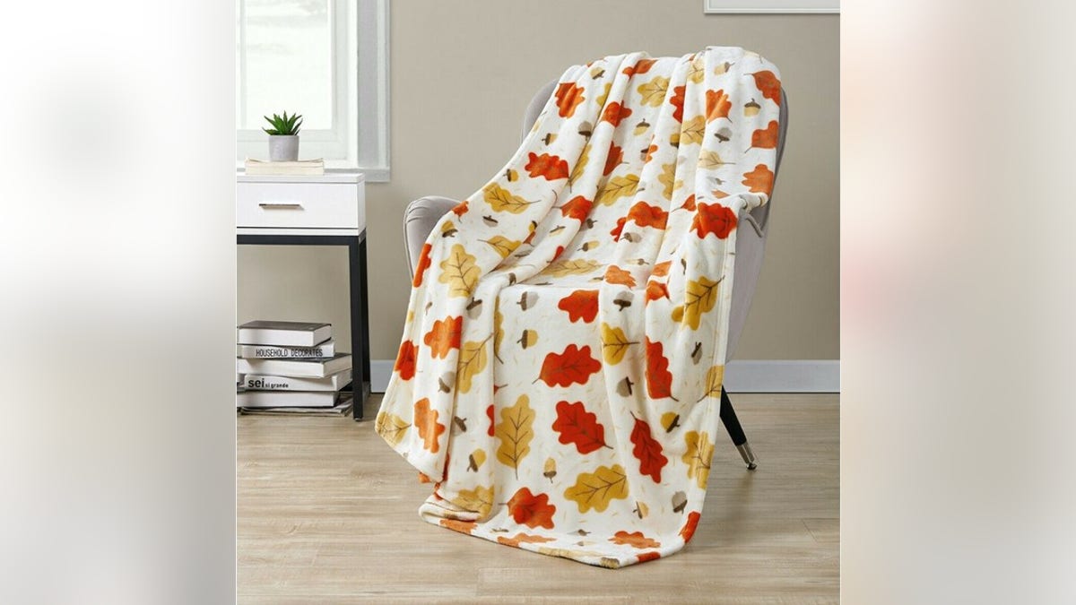 A decorative throw makes the season complete.