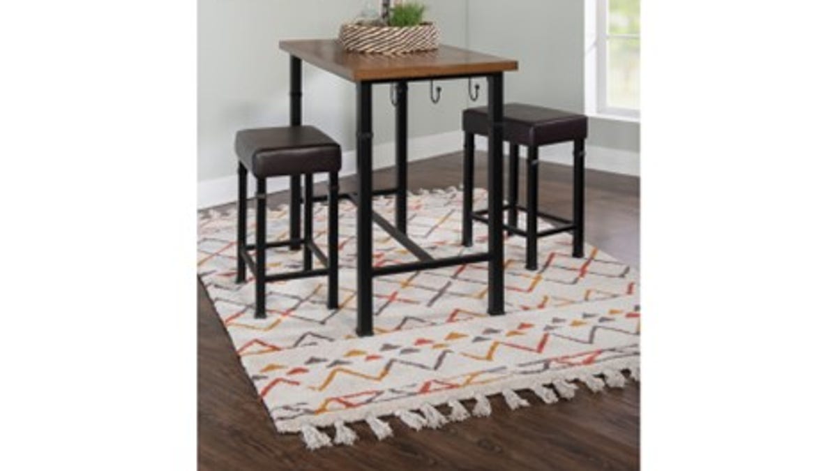 A cute bar table for small spaces.