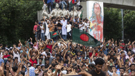 PHOTOS: Bangladesh protesters celebrate as prime minister resigns and flees abroad