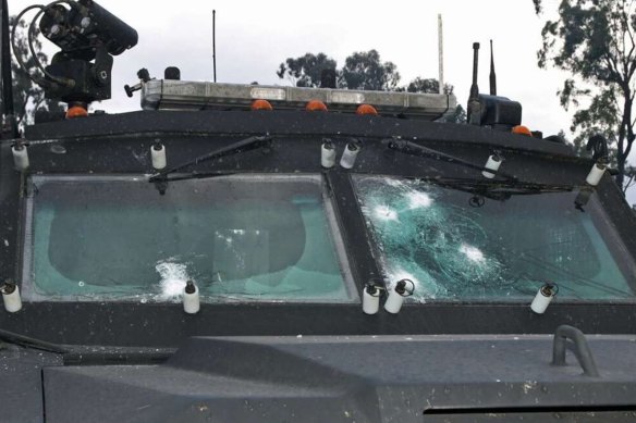 The armoured police BearCat, used by the tactical response team that eventually killed the Trains, came under fire.