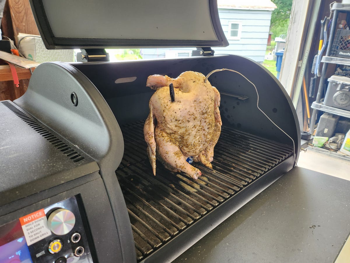 Pellet grill with beer can chicken