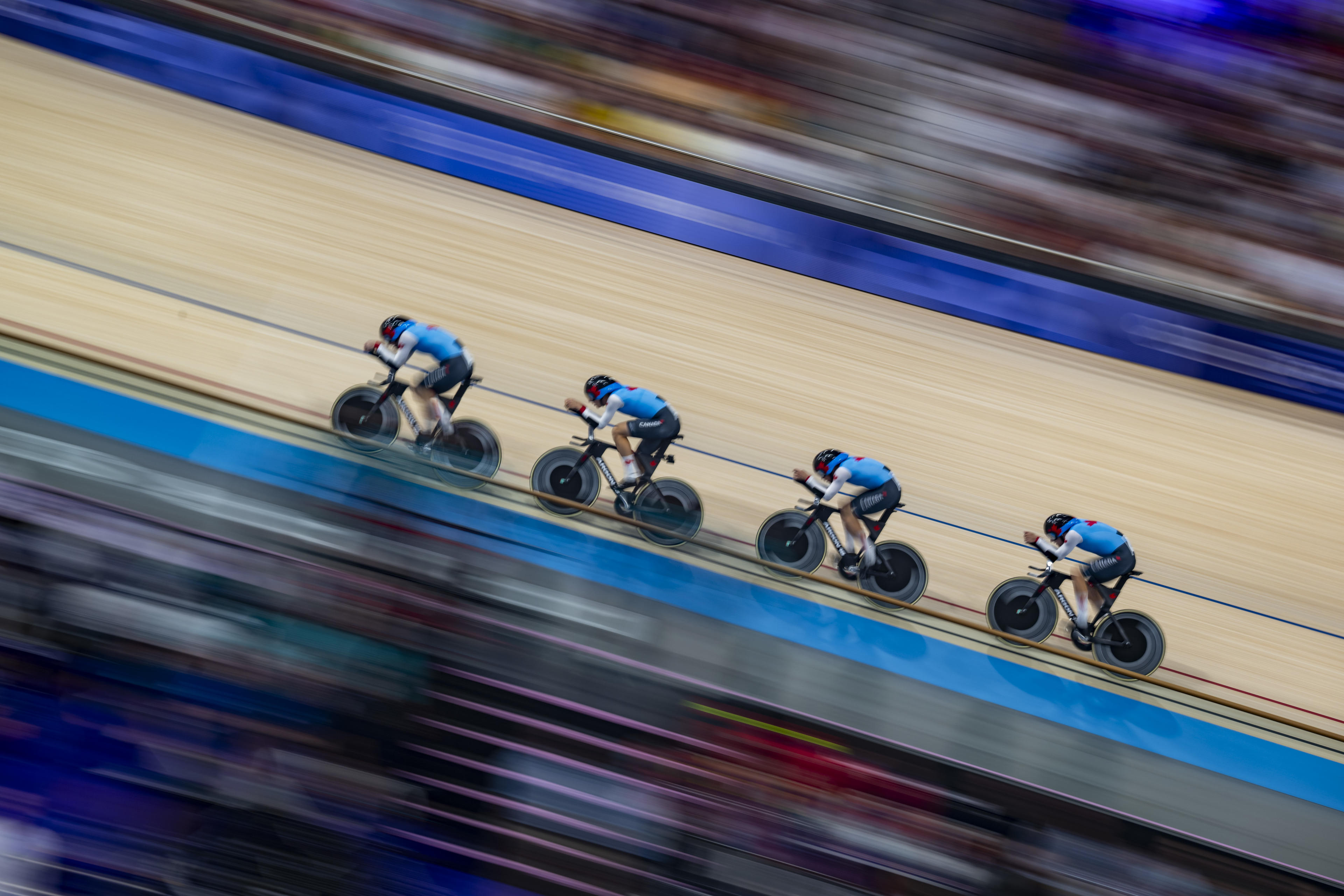 Dylan Bibic, Mathias Guillemette, Michael Foley and Carson Mattern of Canada compete during the men's team pursuit finals.
