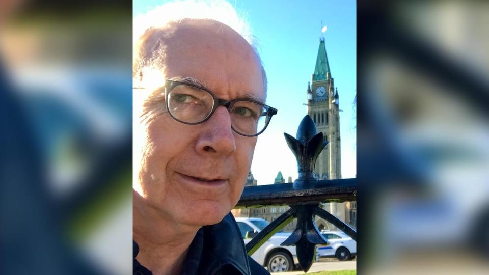 Paul Cadario takes a selfie in front of Parliament Hill in Ottawa. Cadario says he filed a complaint with CATSA after a negative experience at the Ottawa airport this summer.