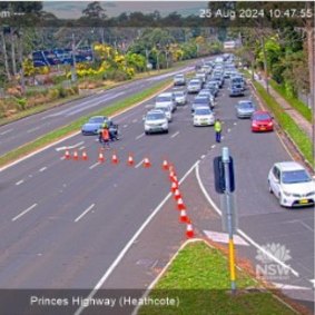 The Princes Highway is closed at Heathcote after a car crash and alleged stabbings.
