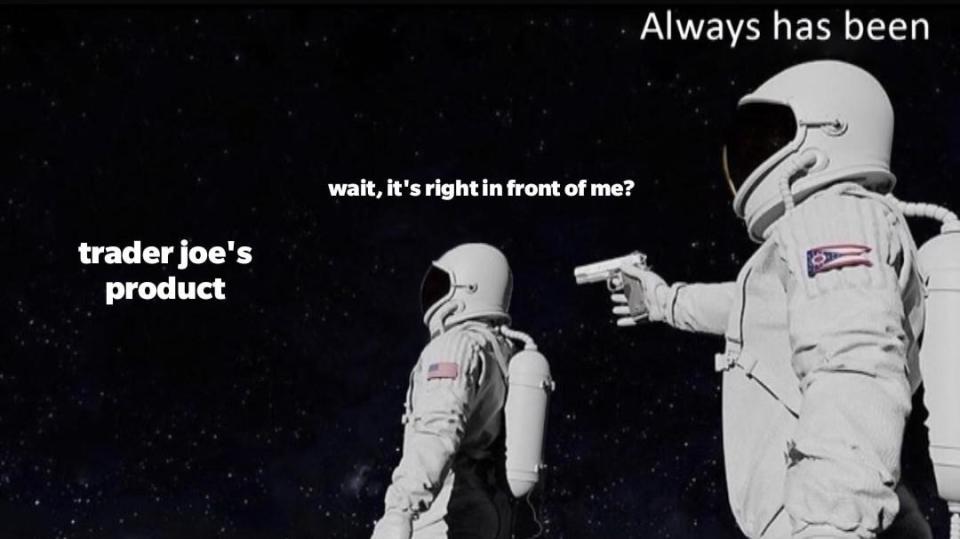 Meme of a customer getting told the product is in front of them and the person holding a gun behind them