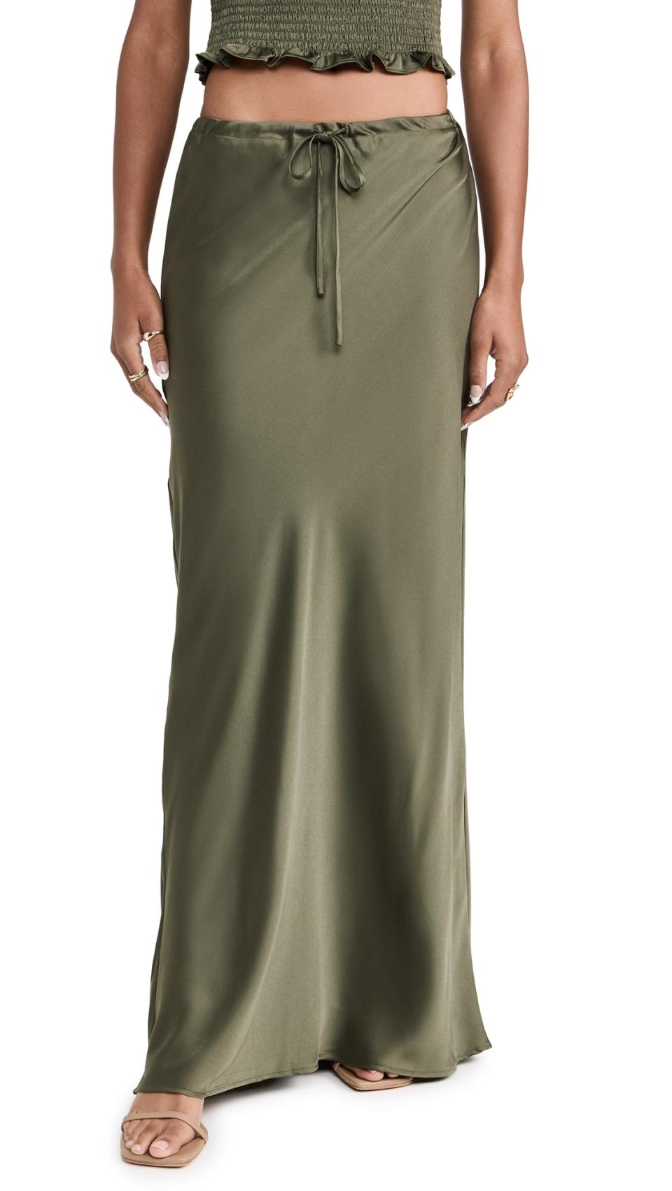 <p><a href="https://www.amazon.com/dp/B0CTKSDPSD?tag=syn-yahoo-20&ascsubtag=%5Bartid%7C10051.g.40754525%5Bsrc%7Cyahoo-us" data-i13n="elm:affiliate_link;elmt:premonetized" rel="sponsored" target="_blank" data-ylk="slk:Shop Now;elm:affiliate_link;elmt:premonetized;itc:0;sec:content-canvas" class="link  rapid-with-clickid etailiffa-link">Shop Now</a></p> <p>Drawstring Skirt</p> <p>amazon.com</p> <p>$79.20</p>