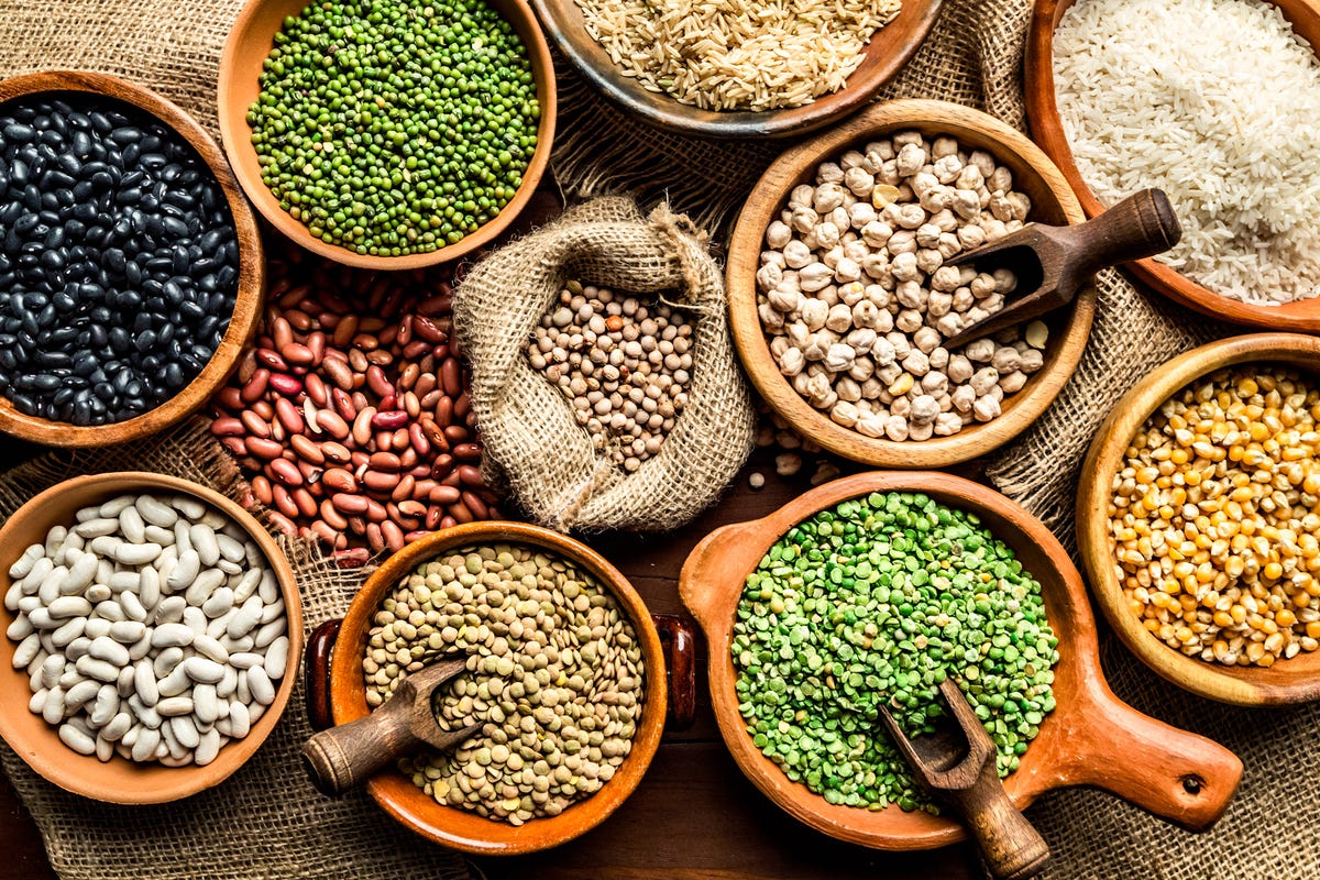 Top view of beans, seeds on rustic wood table