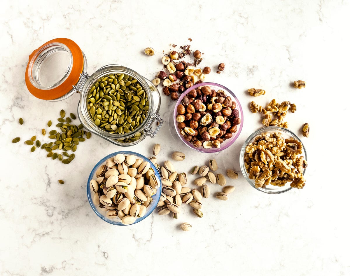 Close-up of jars full of seeds and nuts