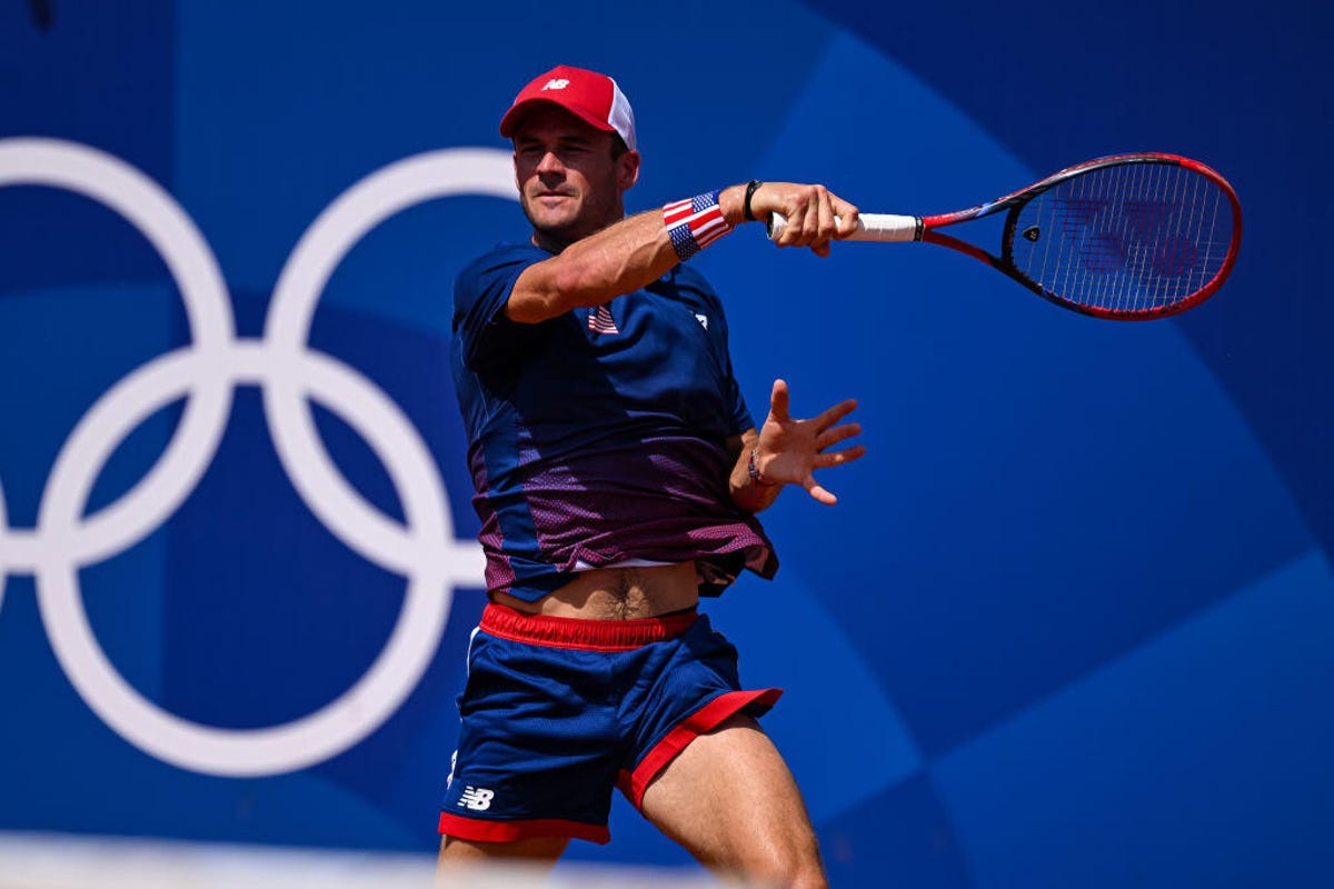 Tommy Paul of the United States in action against Jakub Mensik of Czech Republic during the Men's Singles second round match on day four of the Olympic Games Paris 2024 at Roland Garros