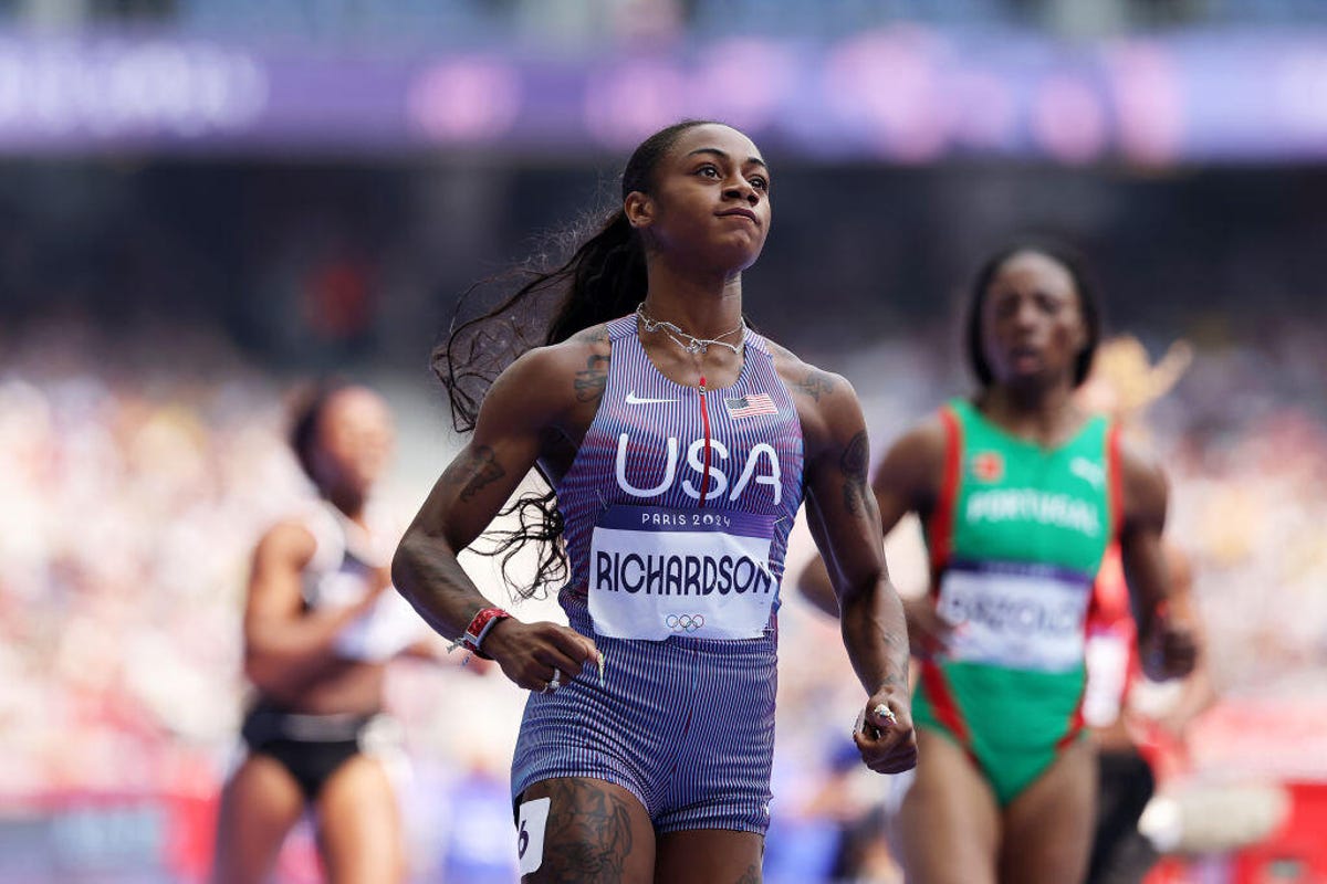 Sha'carri Richardson of Team United States of America competes during the Women's 100m Round 1 - Heat 1 on day seven of the Olympic Games Paris 2024 at Stade de France