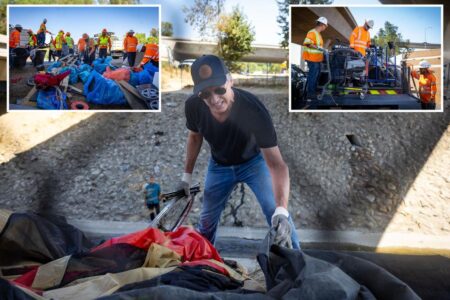 California Gov. Gavin Newsom seen cleaning up homeless encampment after issuing executive order to tear them down