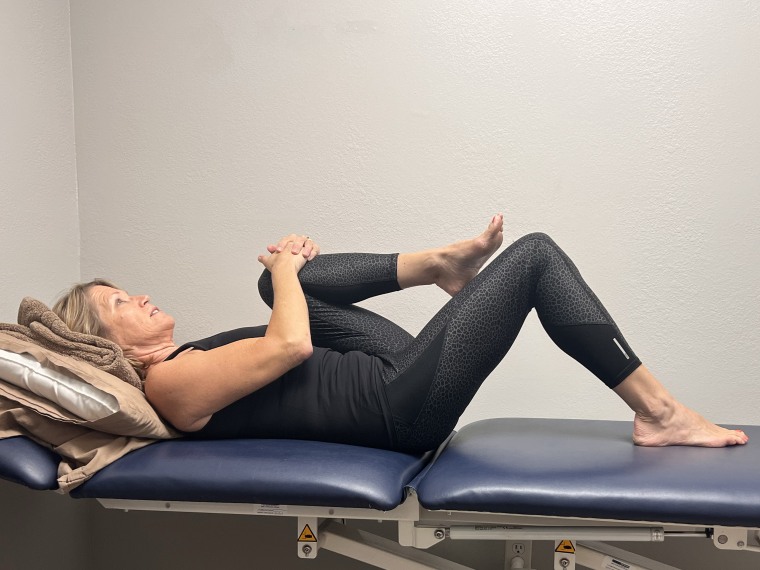 Single knee to chest stretch.