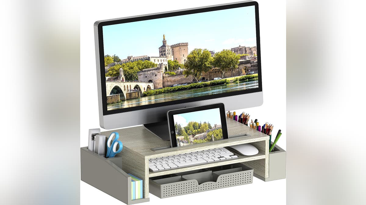 Lift your monitor to clear up clutter.