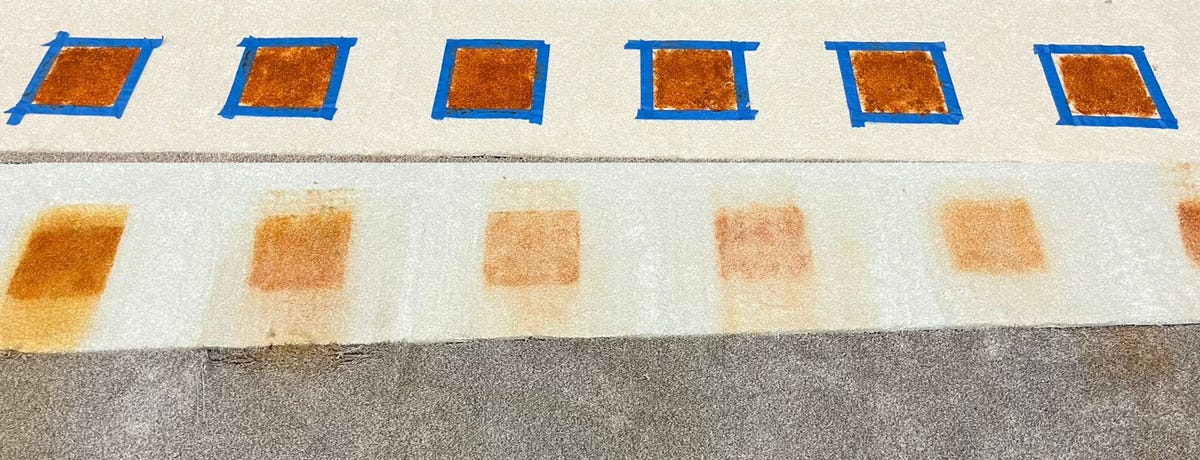 A before-and-after shot showcases the results of CNET's tough mess test for carpet cleaners, where each cleaner does its best to clean marinara sauce off of a white carpet. None of the cleaners we tested removed the stain outright, but some were a lot better than others.