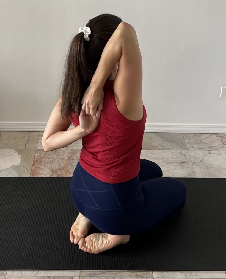 upper body stretches Cow face pose
