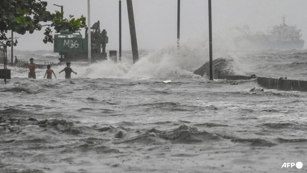 More than 10 dead as tropical storm floods Philippines, disrupting schools and flights