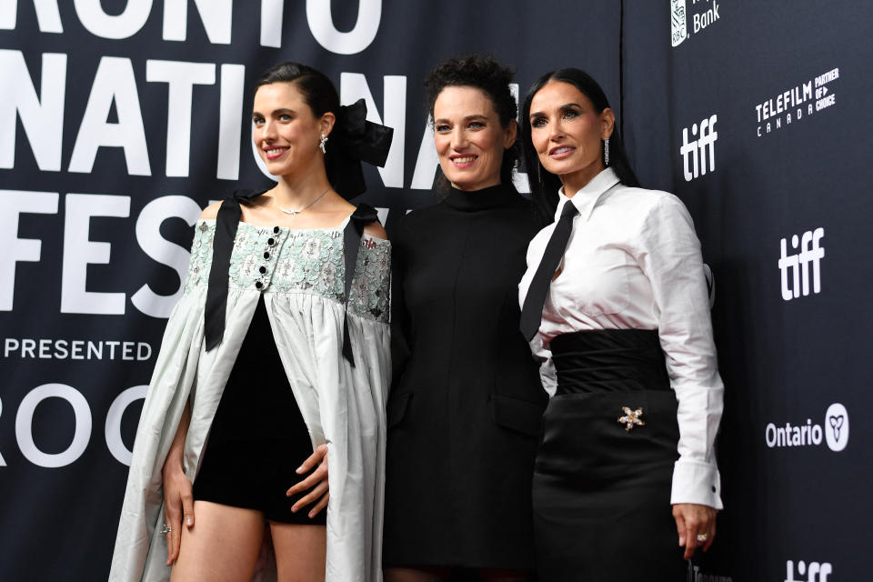(L-R) Actress Margaret Qualley, director Coralie Fargeat and actress Demi Moore attend the North American premiere of