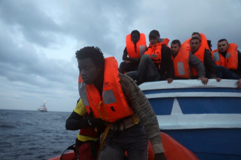 A migrant boat being rescued