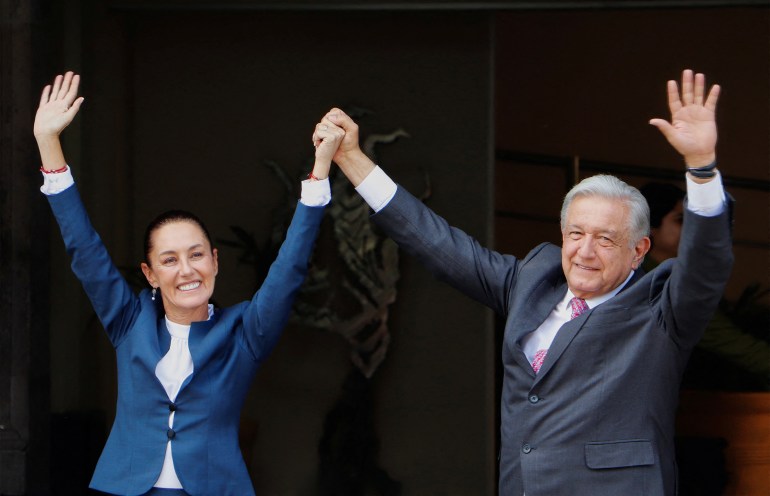 Mexico's President Andres Manuel Lopez Obrador and president-elect Claudia Sheinbaum gesture after Sheinbaum arrived to the National Palace for a private meeting, in Mexico City, Mexico June 10, 2024. Mexico Presidency/Handout via REUTERS ATTENTION EDITORS - THIS IMAGE HAS BEEN SUPPLIED BY A THIRD PARTY. NO RESALES. NO ARCHIVES.