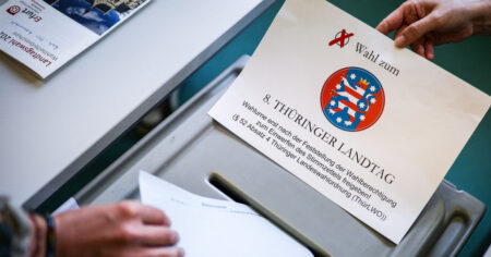 German far-right party leads exit polls in state elections