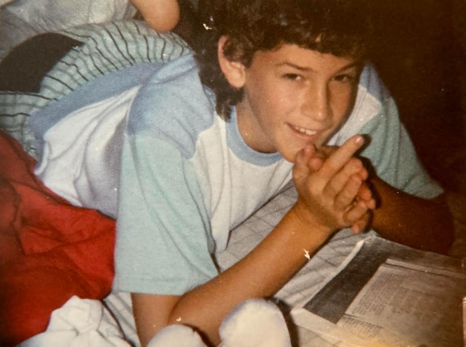 The author studying at home for his bar mitzvah reading