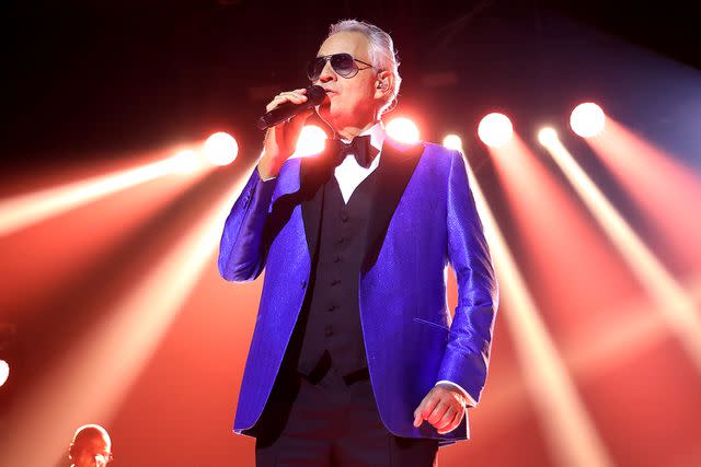 <p>John Parra/Getty</p> Andrea Bocelli performs in Seville in November 2023