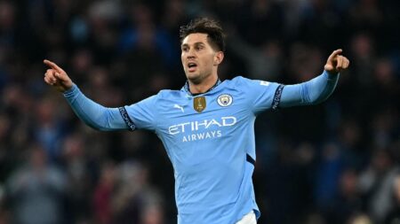 Manchester City 2-2 Arsenal: John Stones snatches draw as 10-man Gunners denied in furious finale