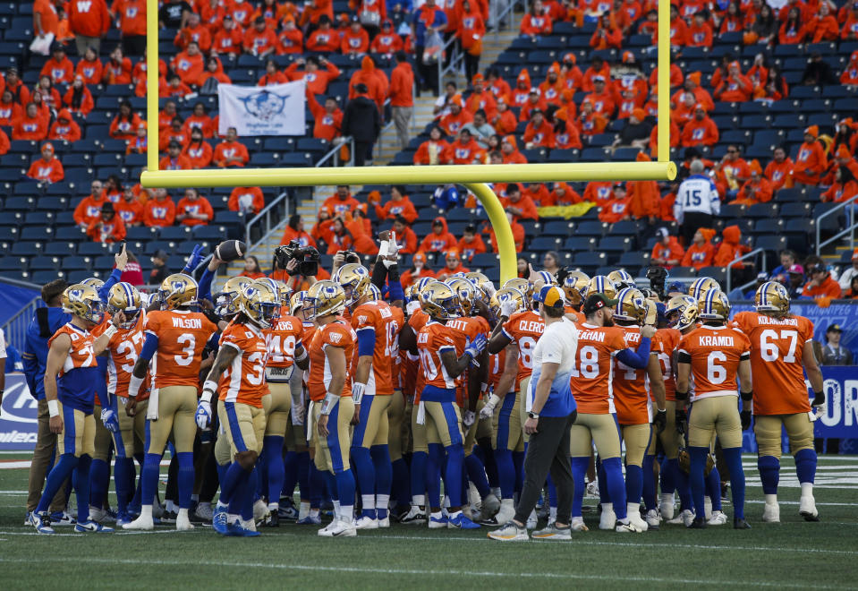 Winnipeg Blue Bombers warm up with Truth and Reconciliation Day orange jerseys and logos prior to their Edmonton Elks CFL action in Winnipeg Friday, September 27, 2024.    THE CANADIAN PRESS/John Woods
