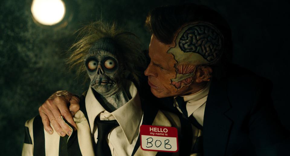 Wolf Jackson (Willem Dafoe) is an action movie star who died and became a cop in the Afterlife in "Beetlejuice Beetlejuice."