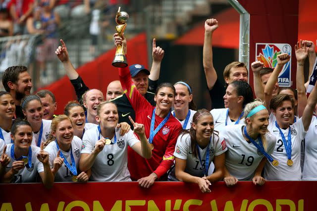 <p>Ronald Martinez/Getty</p> Hope Solo #1 and the United States celebrates after winning the FIFA Women's World Cup Canada 2015 5-2 against Japan at BC Place Stadium on July 5, 2015