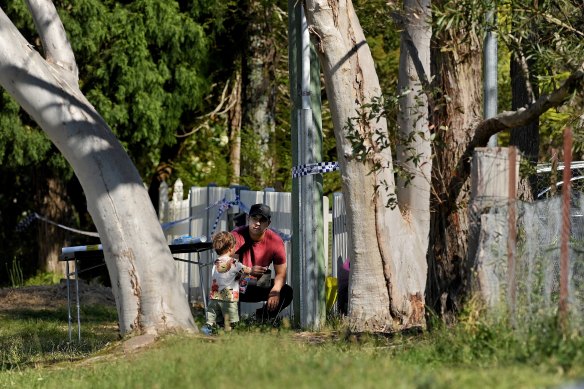 Members of the Blue Mountains community arrived at the home on Wednesday to lay flowers and pay tribute.