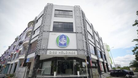 Malaysia arrests CEO of Islamic firm as police widen raids in child sex abuse case