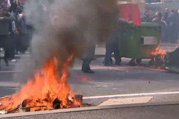 A fire burning on the Clarendon Street bridge during anti-war protests.