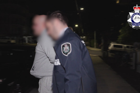 One of the arrests from the AFP raids that swept through Sydney on Tuesday.