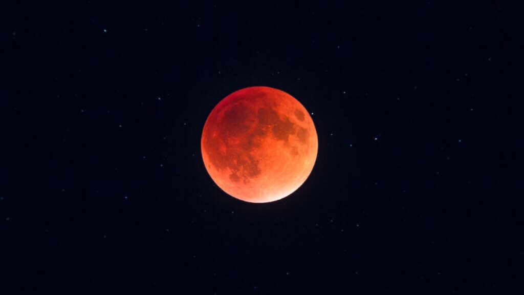 Here’s How to See Tuesday’s Super Harvest Blood Moon and Partial Lunar Eclipse