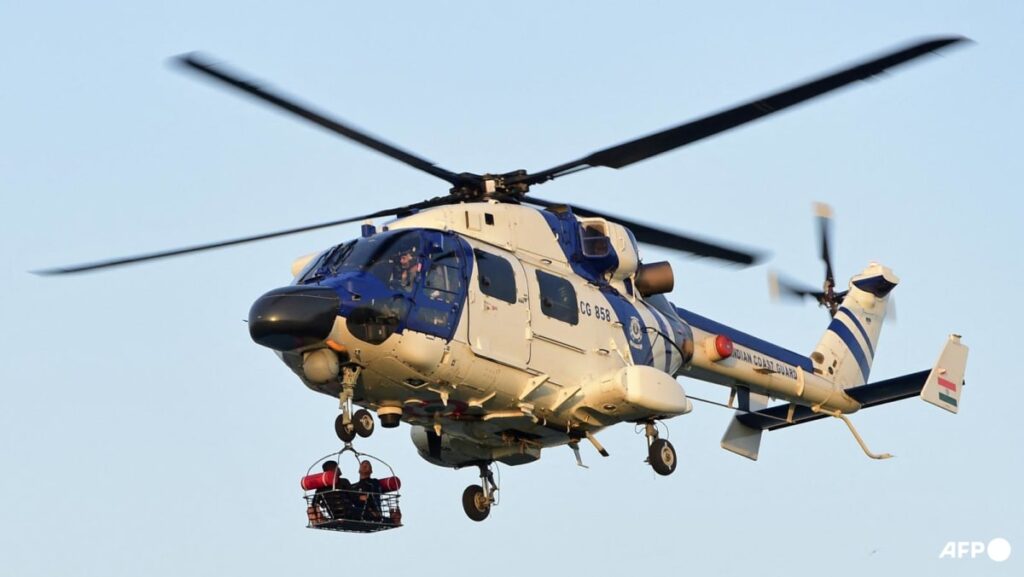 India searches for coast guard crew after helicopter crash