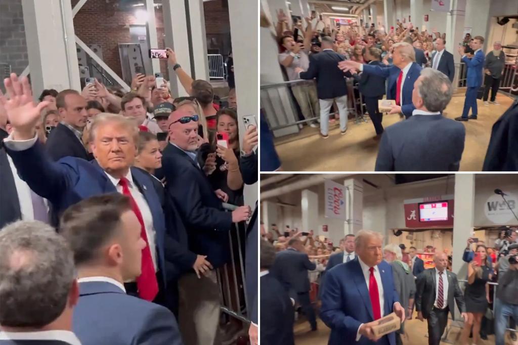 Trump greeted by chants of ‘USA,’ tosses popcorn to fans as he attends Alabama vs. Georgia football game
