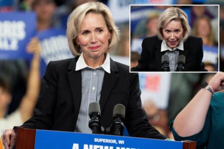 Tim Walz’s wife sparks groans with anti-Trump hand gesture at rally: ‘Worse than Hillary’