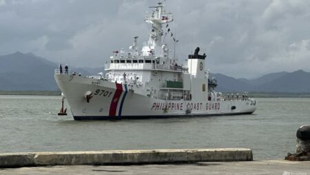 Philippines says disputed reef ‘not lost’ to China despite pullout