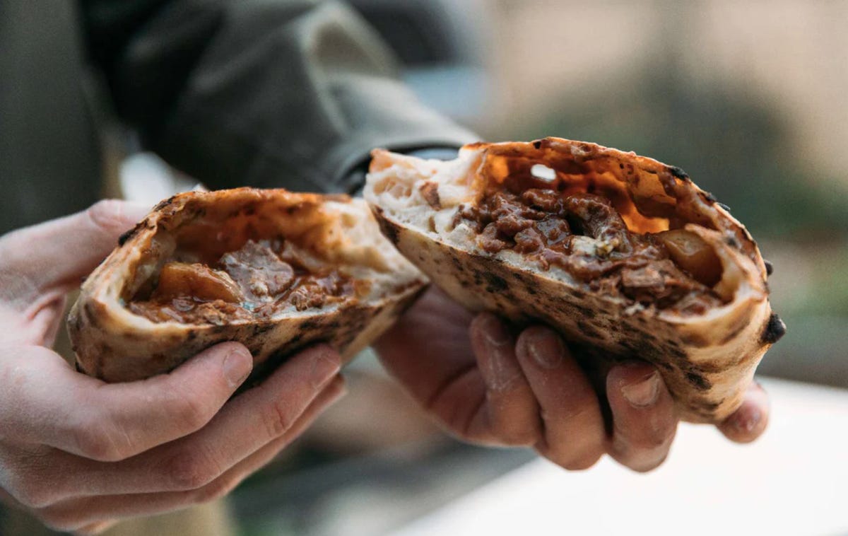 calzone oozing with fillings