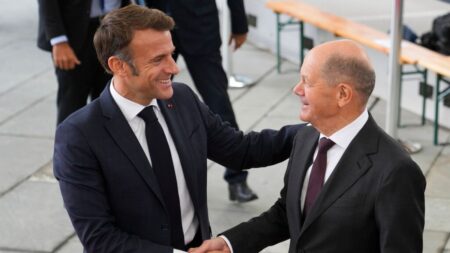 Macron warns of precarious time for Europe as he visits Berlin