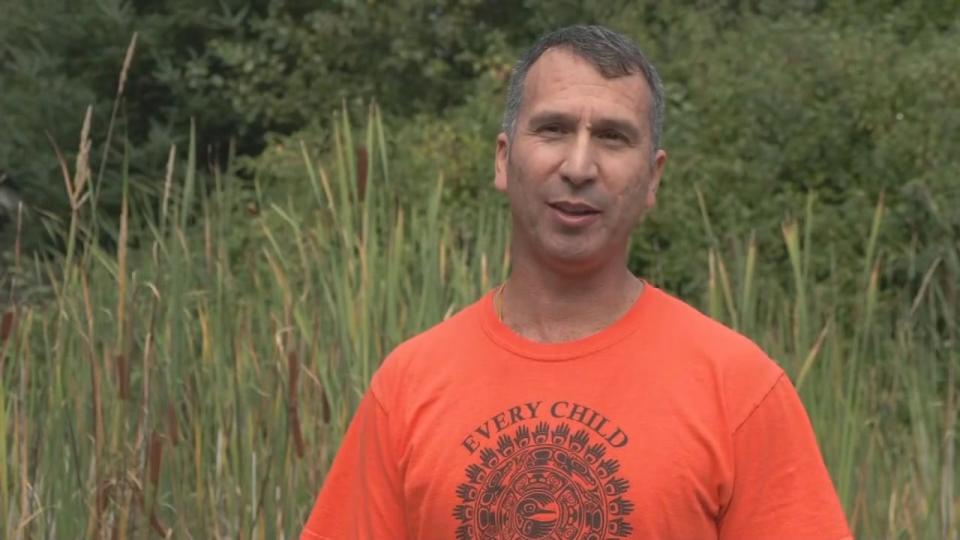 Danilo Caron, a UBC engineering graduate, was wearing orange just like hundreds of others at the event — in honour of Phyllis Webstad, a residential school survivor whose orange shirt was taken away from her when she arrived at the institution.