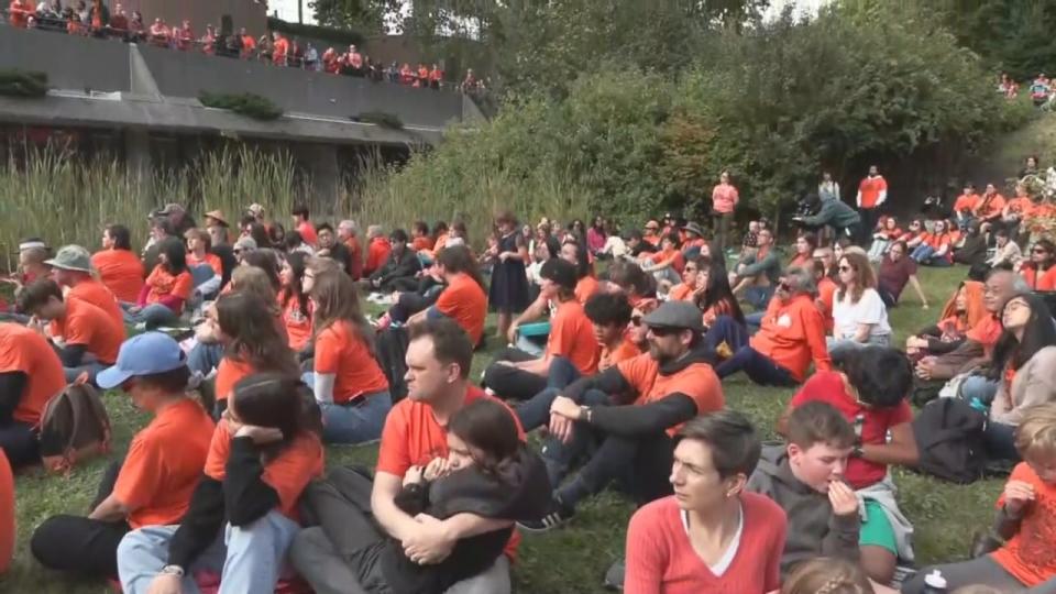 Hundreds of people gathered at the Indian Residential School History and Dialogue Centre at UBC's campus on Monday.