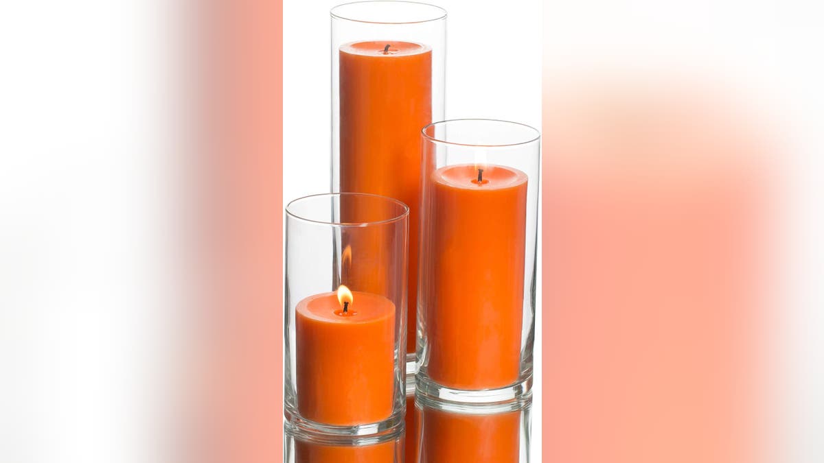 Brighten up your table with pillar candles and glass holders.