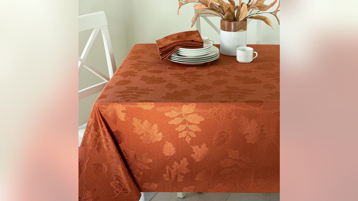 Cover your table with a beautiful holiday tablecloth.