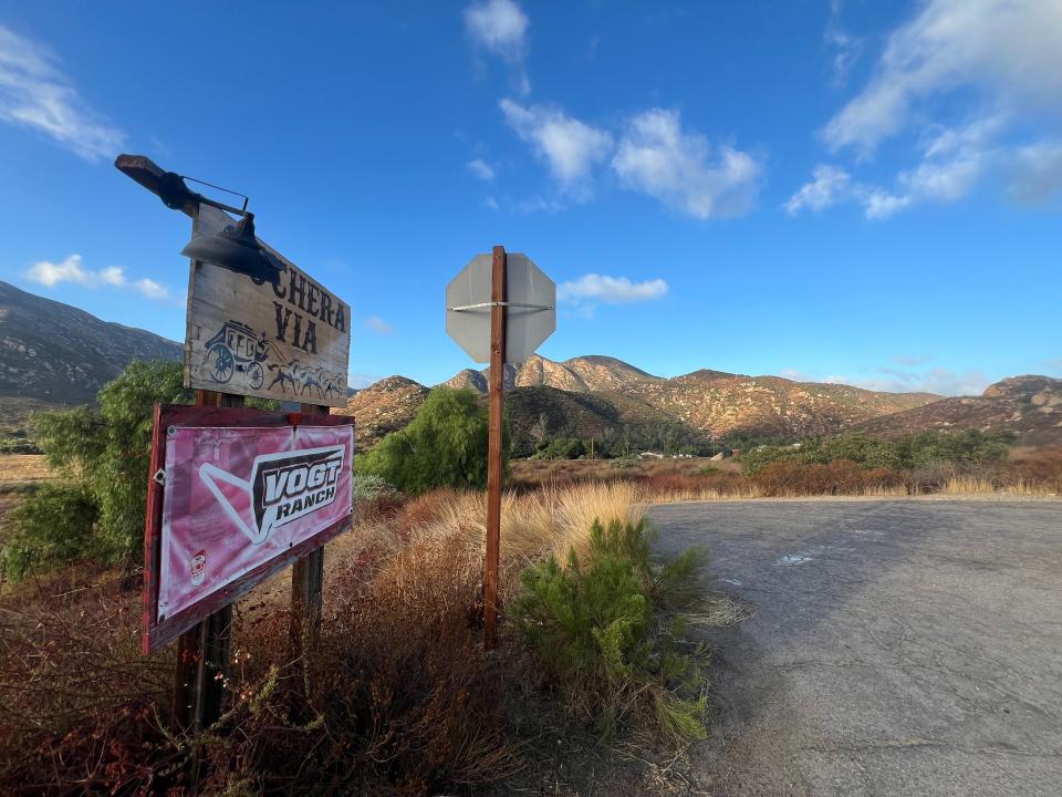 At this remote school bus stop, just east of Dulzura, CA, Guadalupe Dukes and her grandson Gael had an encounter with a group of migrants that was discussed on social media across the globe.